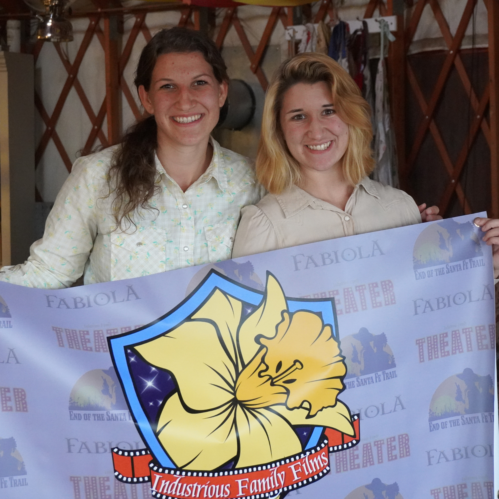 Mary Bowen and Faustina Bowen with Industrious Family Banner