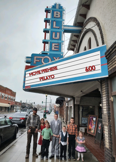 cast stands before the Pelayo Marquee sign cast stands before the Pelayo Marquee sign